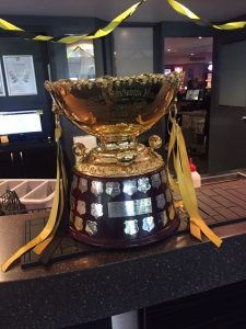 The Thomas Seymour-Hill Cup with Black and Gold ribbons - teh colours of the 2019 SANFL Premiers - Glenelg.